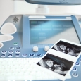 Ultrasound scanning machine with sonogram picture on keyboard copyspace pregnancy diagnostic healthcare medical industry scanner device machine concept.